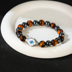 Men’s Evil Eye Beaded Bracelet – 10mm Natural Gemstones (Tiger Eye/ Silver Obsidian/Black Agate/Tiger Eye)) with Protection Charm – Adjustable Elastic, Symbol of Strength & Protection, Perfect Gift for Men